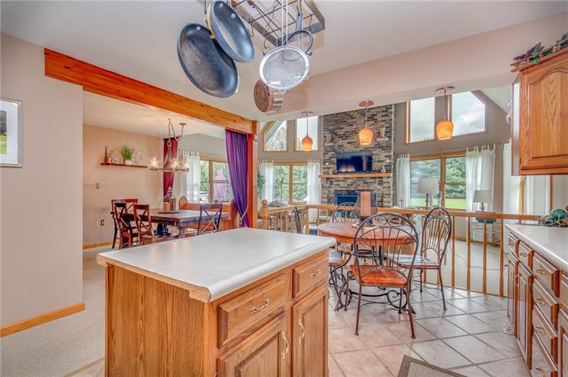 1473 Lovi Road Freedom, PA 15042 - Photo 8 of 22 The 17X10 kitchen is open to greatroom affording outdoor views from the copious window exposure.