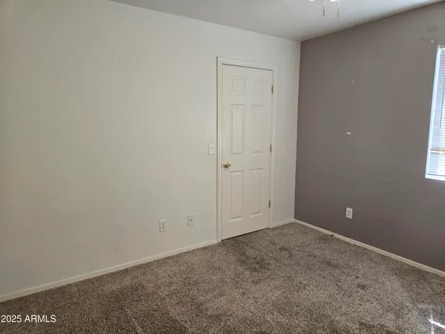 an empty room with an entryway