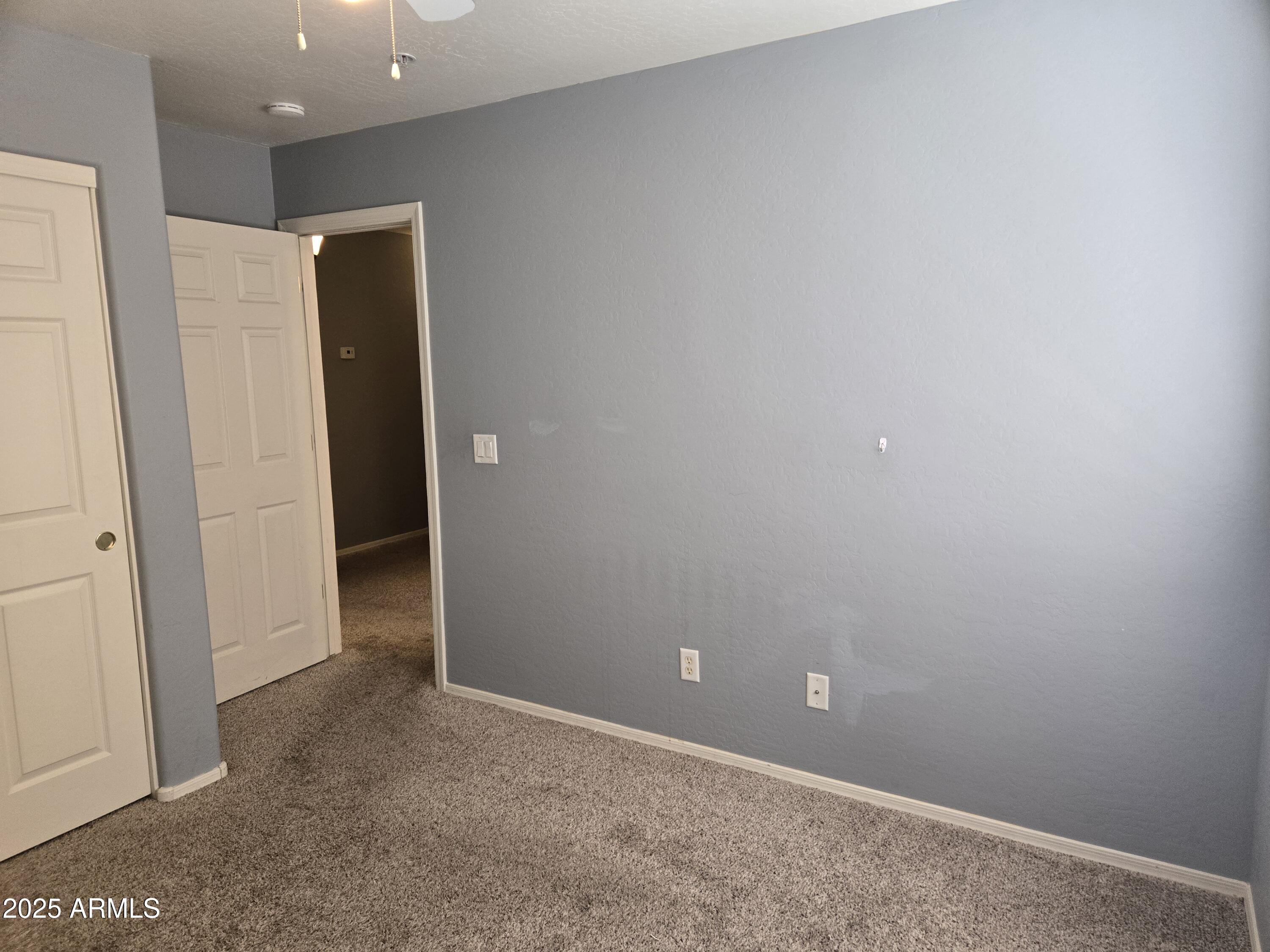 16021 North 30th Street, Unit 119 Phoenix, AZ 85032 - Photo 15 of 28 a view of an empty room