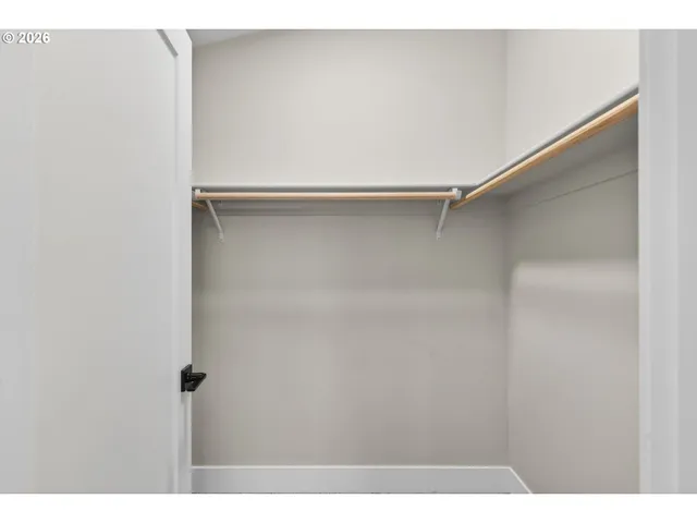a bathroom with a sink double vanity and a mirror