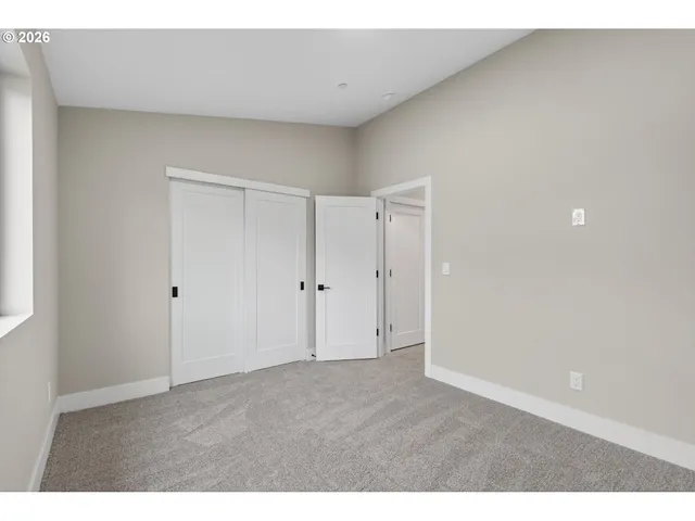 a black and white photo of a fireplace