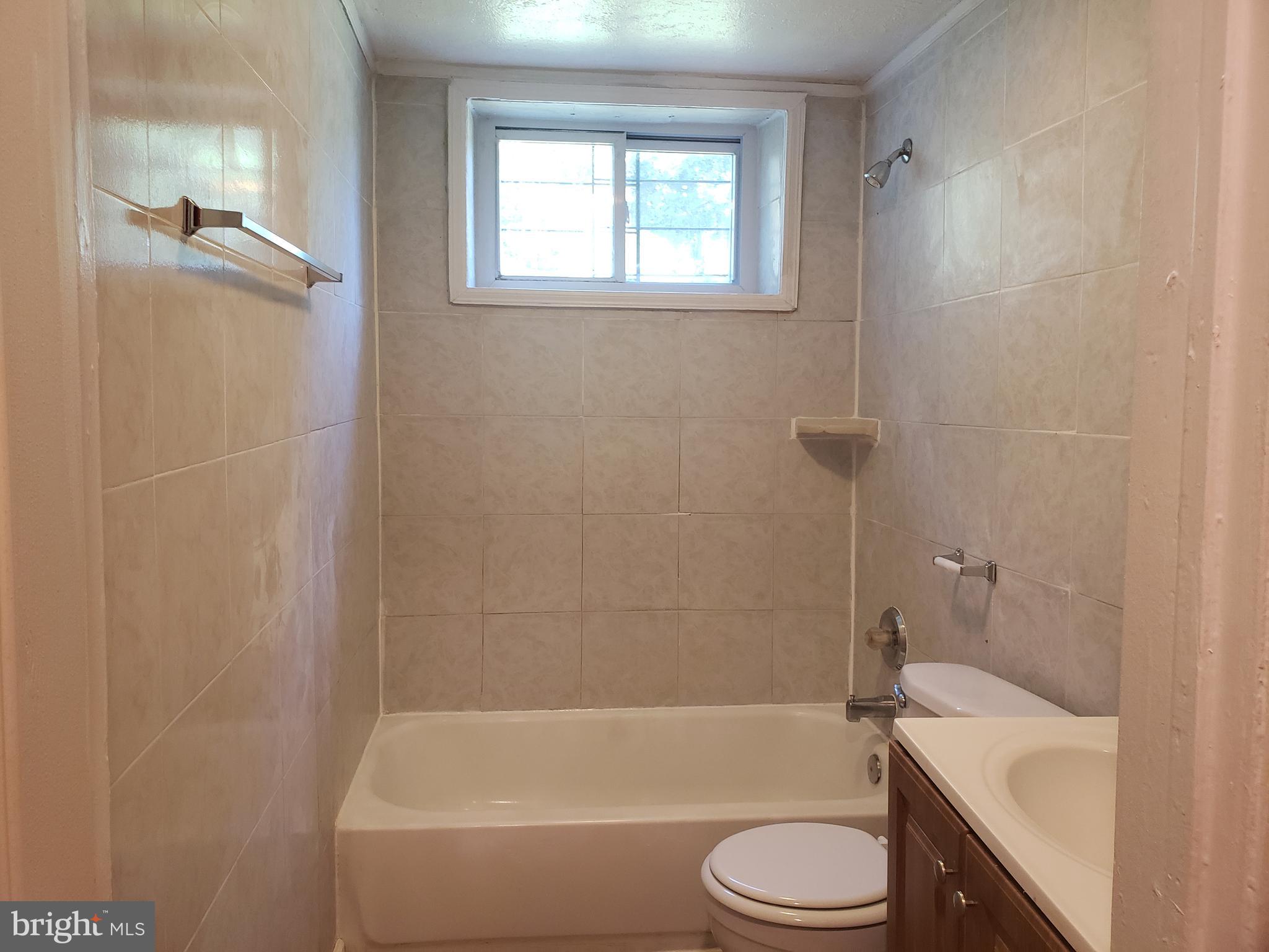 1010 Addison Road South Capitol Heights, MD 20743 - Photo 14 of 28 Main level second bathroom