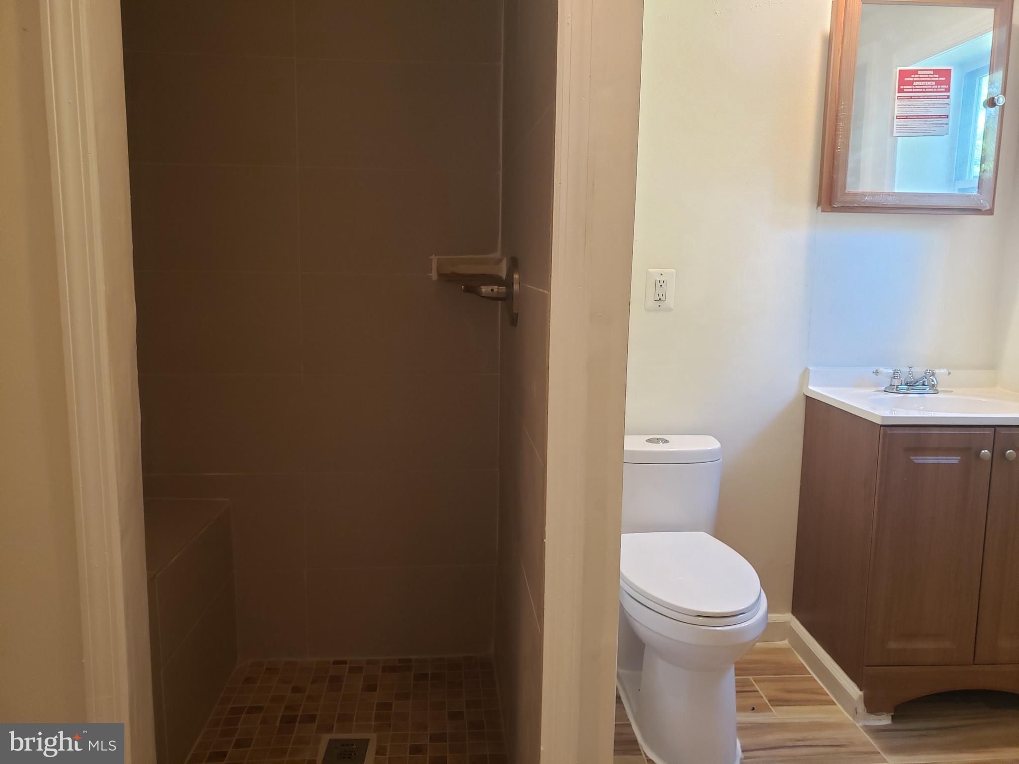 1010 Addison Road South Capitol Heights, MD 20743 - Photo 17 of 28 Main level third bathroom