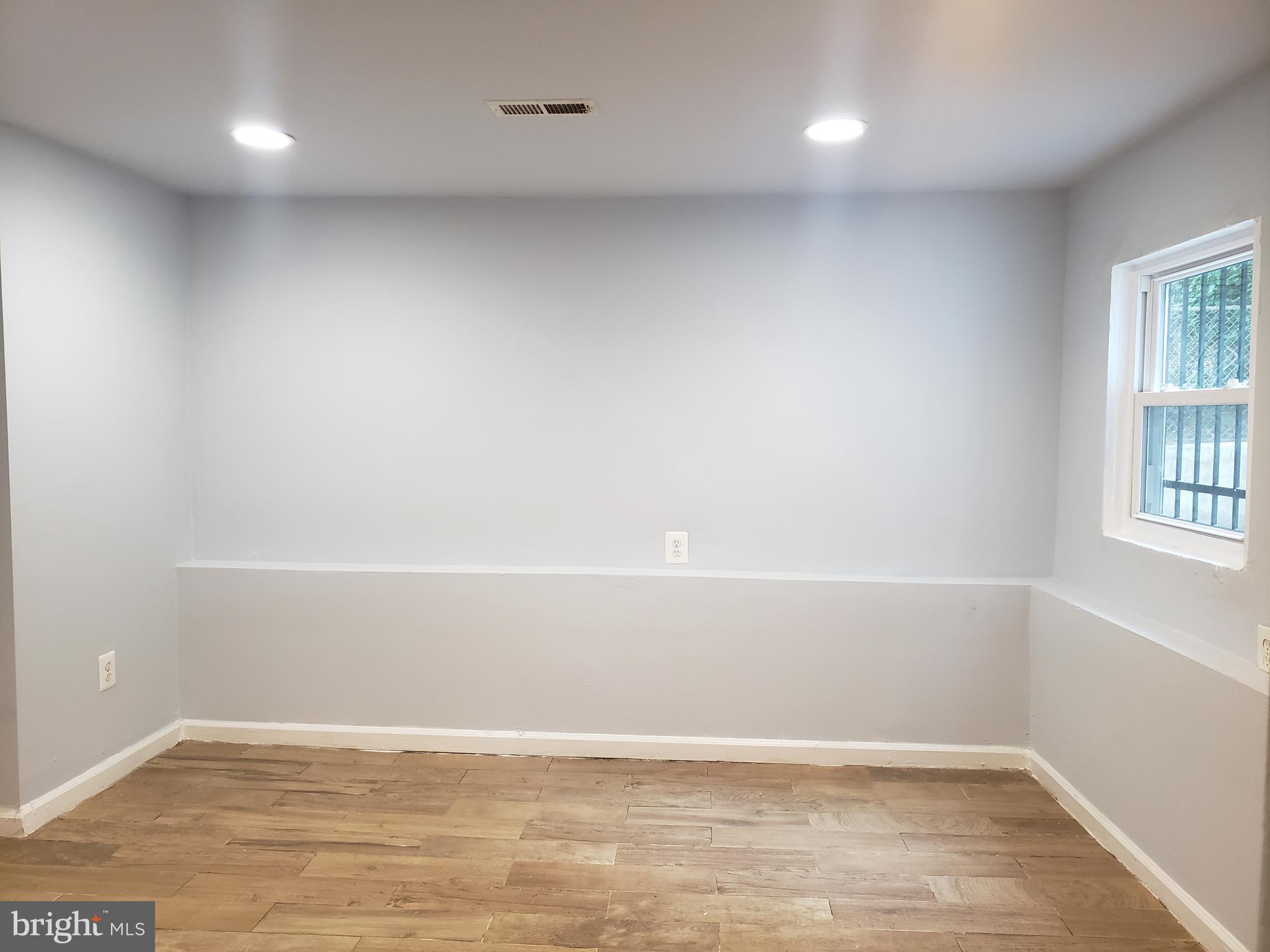 1010 Addison Road South Capitol Heights, MD 20743 - Photo 18 of 28 Main level bedroom 5