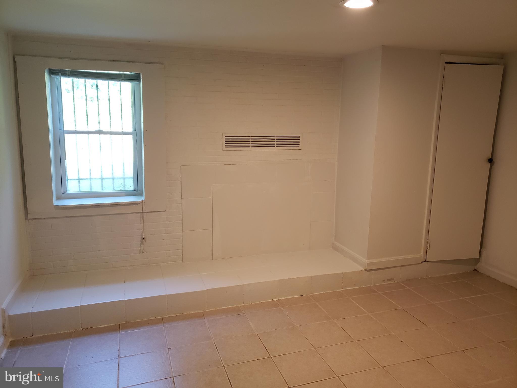 1010 Addison Road South Capitol Heights, MD 20743 - Photo 22 of 28 Lower level bedroom