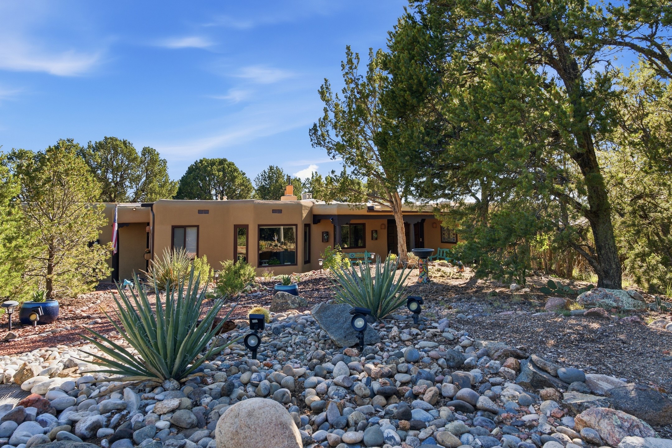 65 Puye Road Santa Fe, NM 87505 - Photo 1 of 62 Nestled in the trees, not visible from the road.