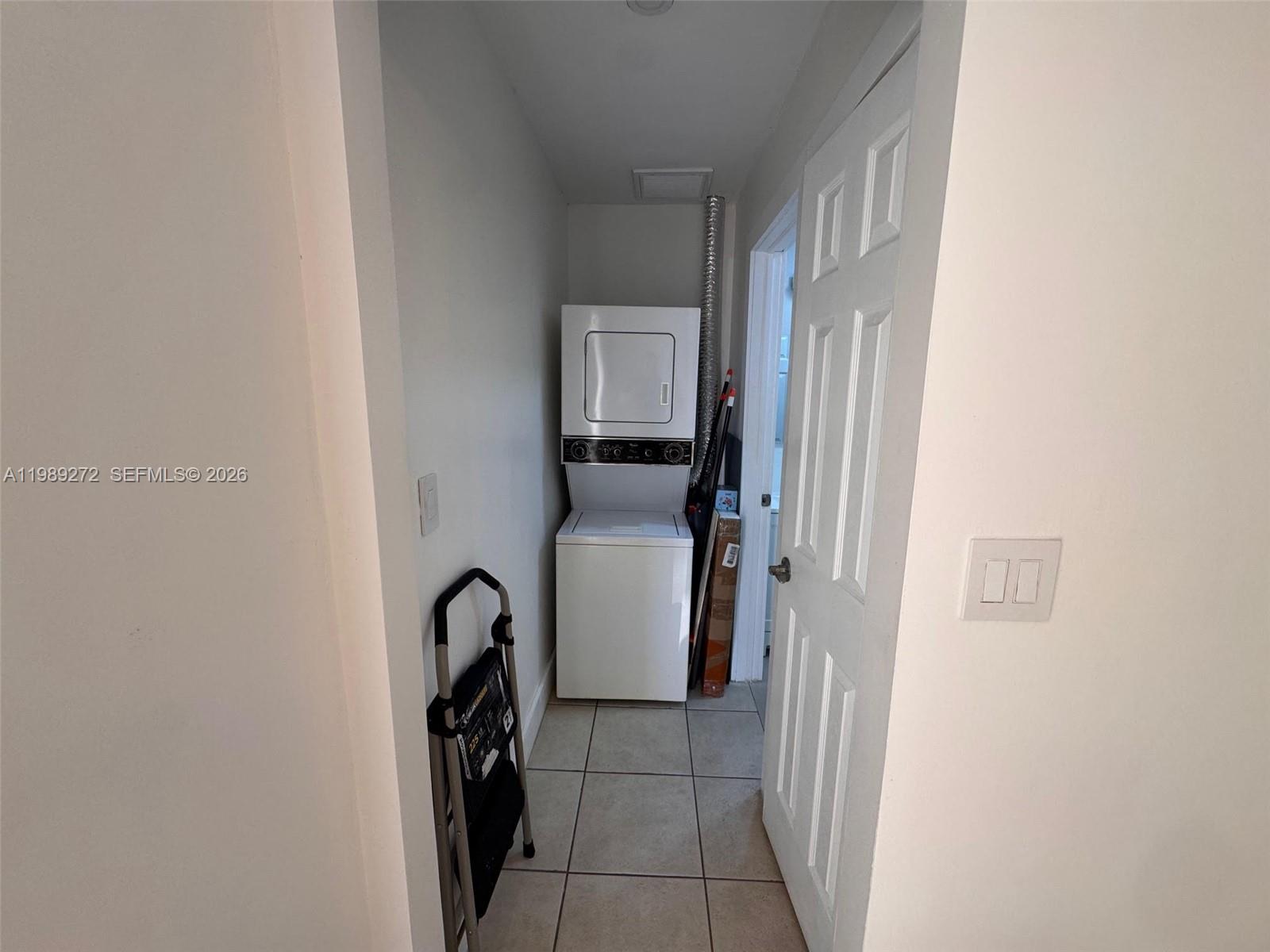 842 Southwest 89th Avenue, Unit B Miami, FL 33174 - Photo 6 of 7 a close view of cabinet and utility room