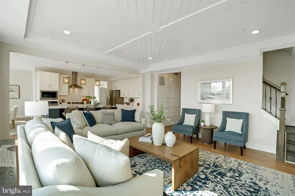 a living room with furniture and a table