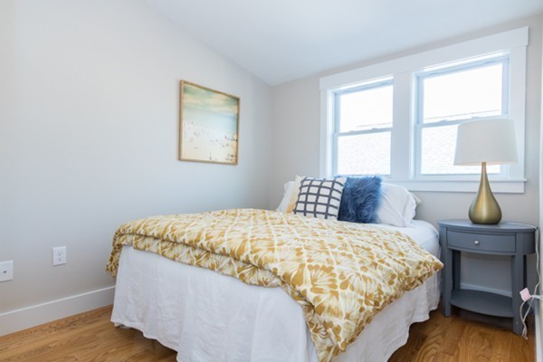 39 Montrose Street, Unit 2 Everett, MA 02149 - Photo 7 of 12 a bedroom with a bed and window