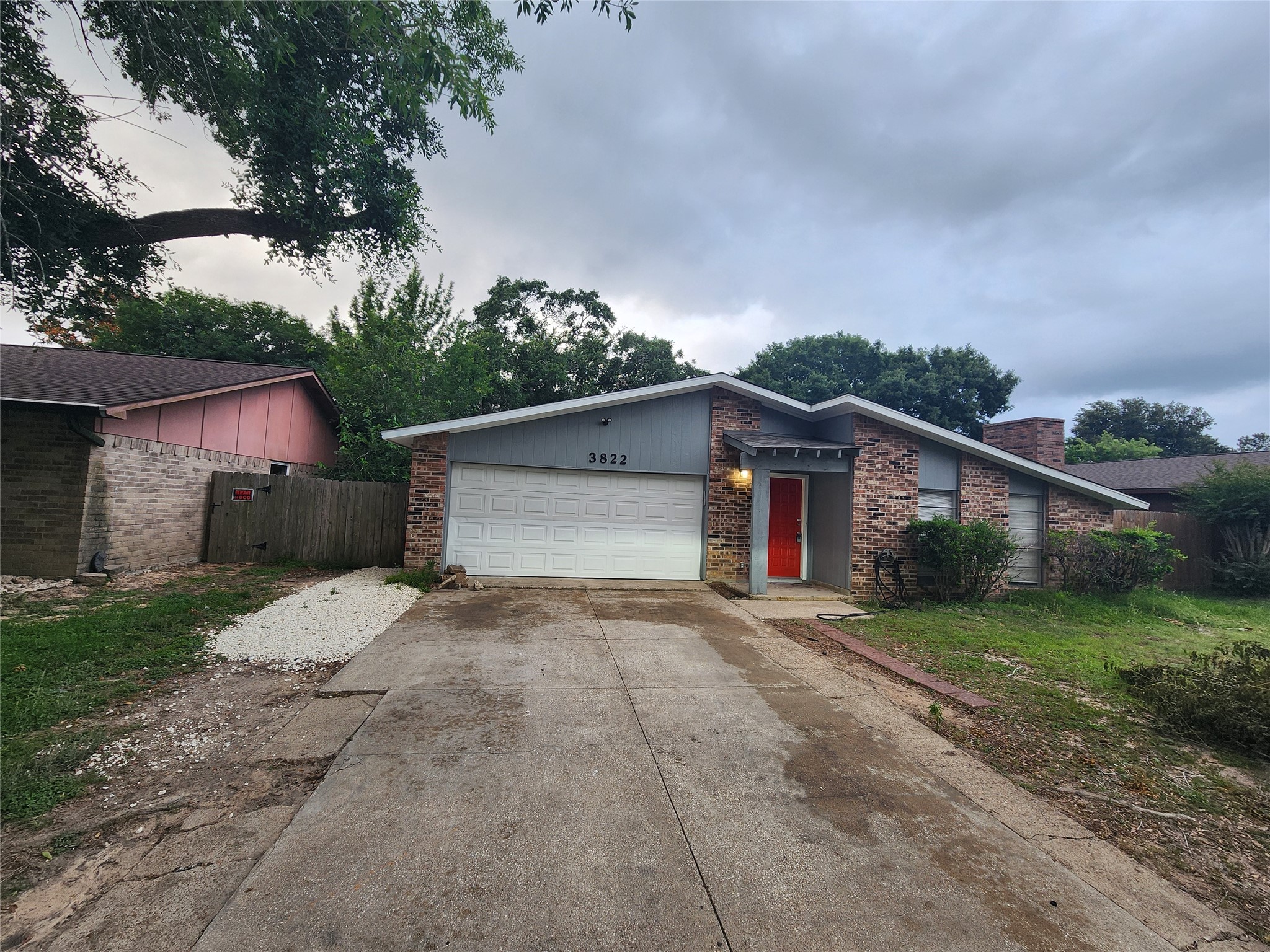 3822 Broken Elm Drive Spring, TX 77388 - Photo 2 of 25 a view of backyard of house garage with green space