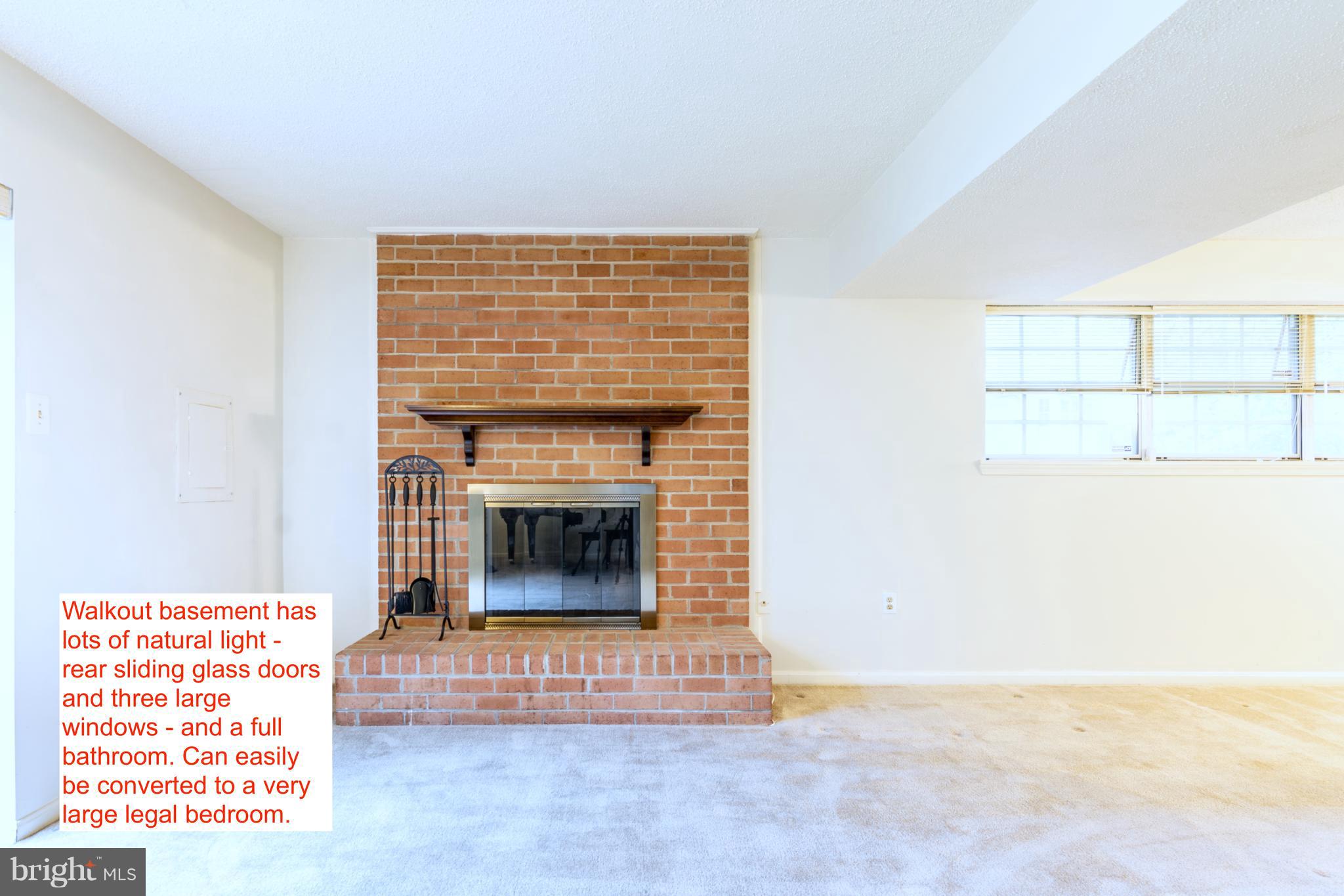11343 Baroque Road Silver Spring, MD 20901 - Photo 22 of 43 Basement: 3 windows and sliding door. Can be a BR
