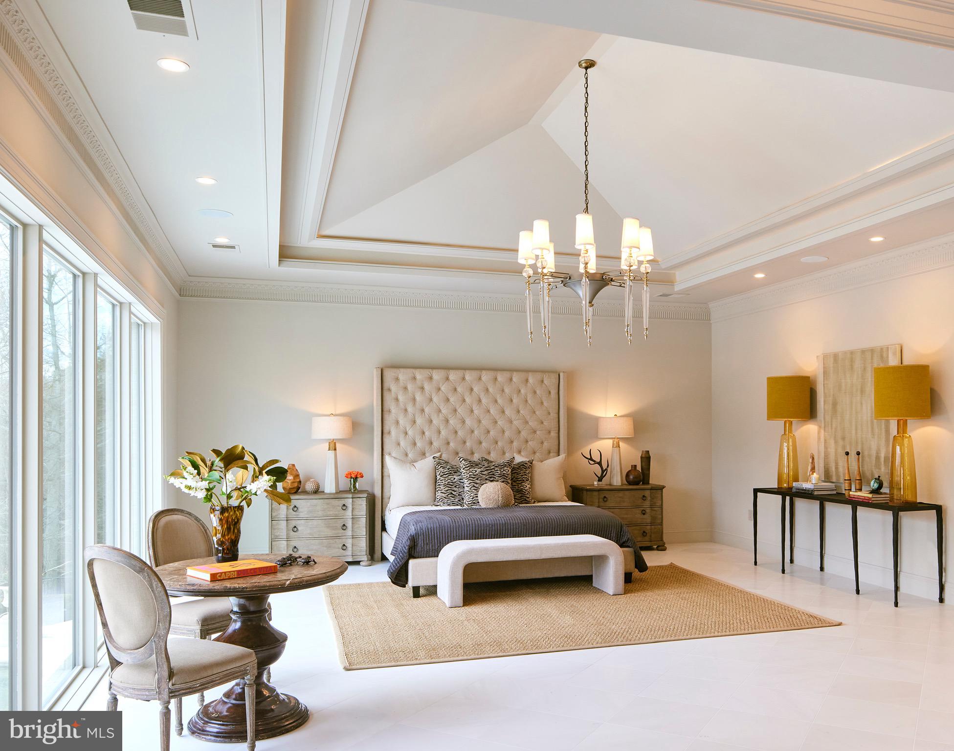 6431 Georgetown Pike McLean, VA 22101 - Photo 26 of 57 a living room with furniture and a chandelier