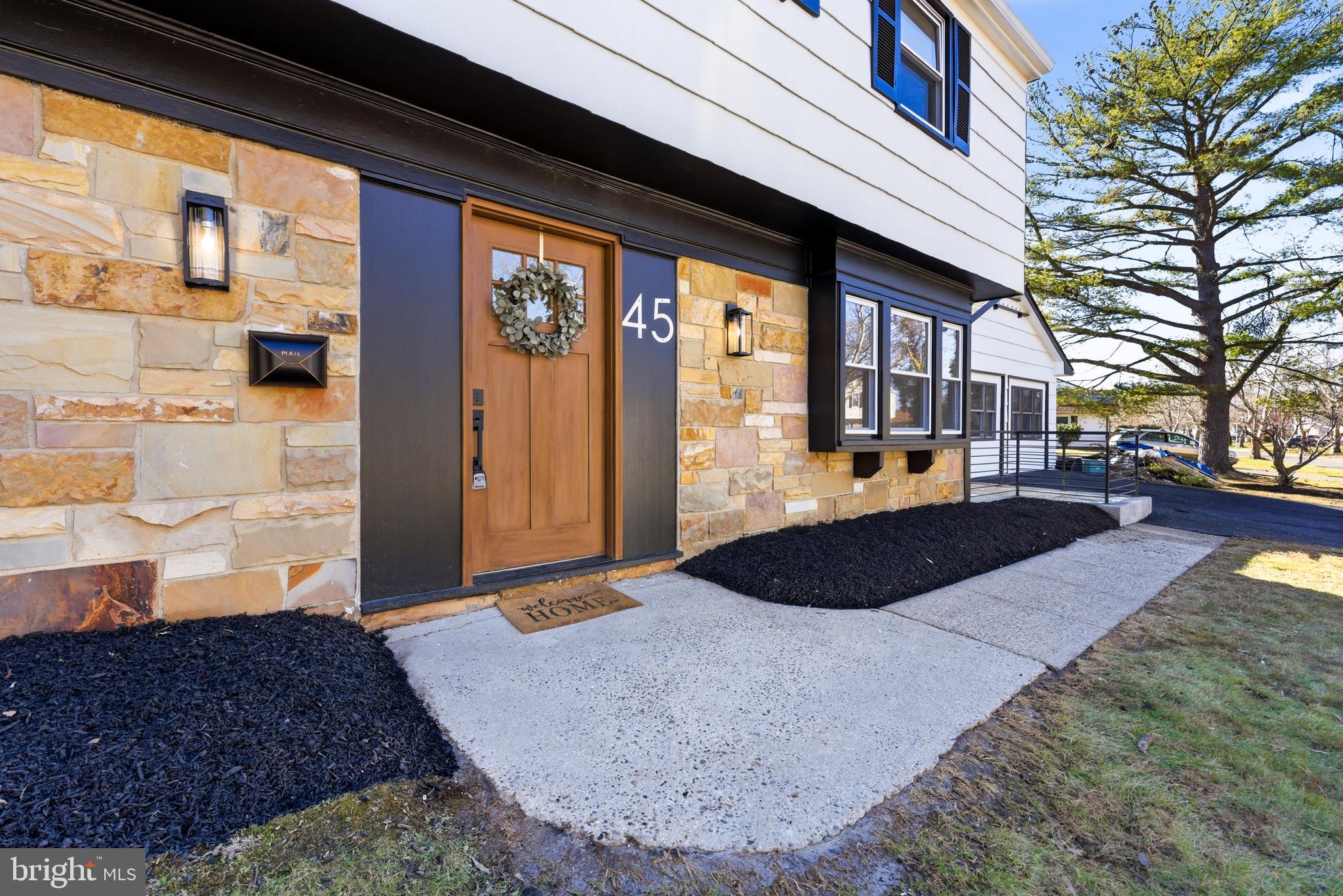 45 Tennyson Lane Willingboro, NJ 08046 - Photo 1 of 1 a front view of a house with a yard