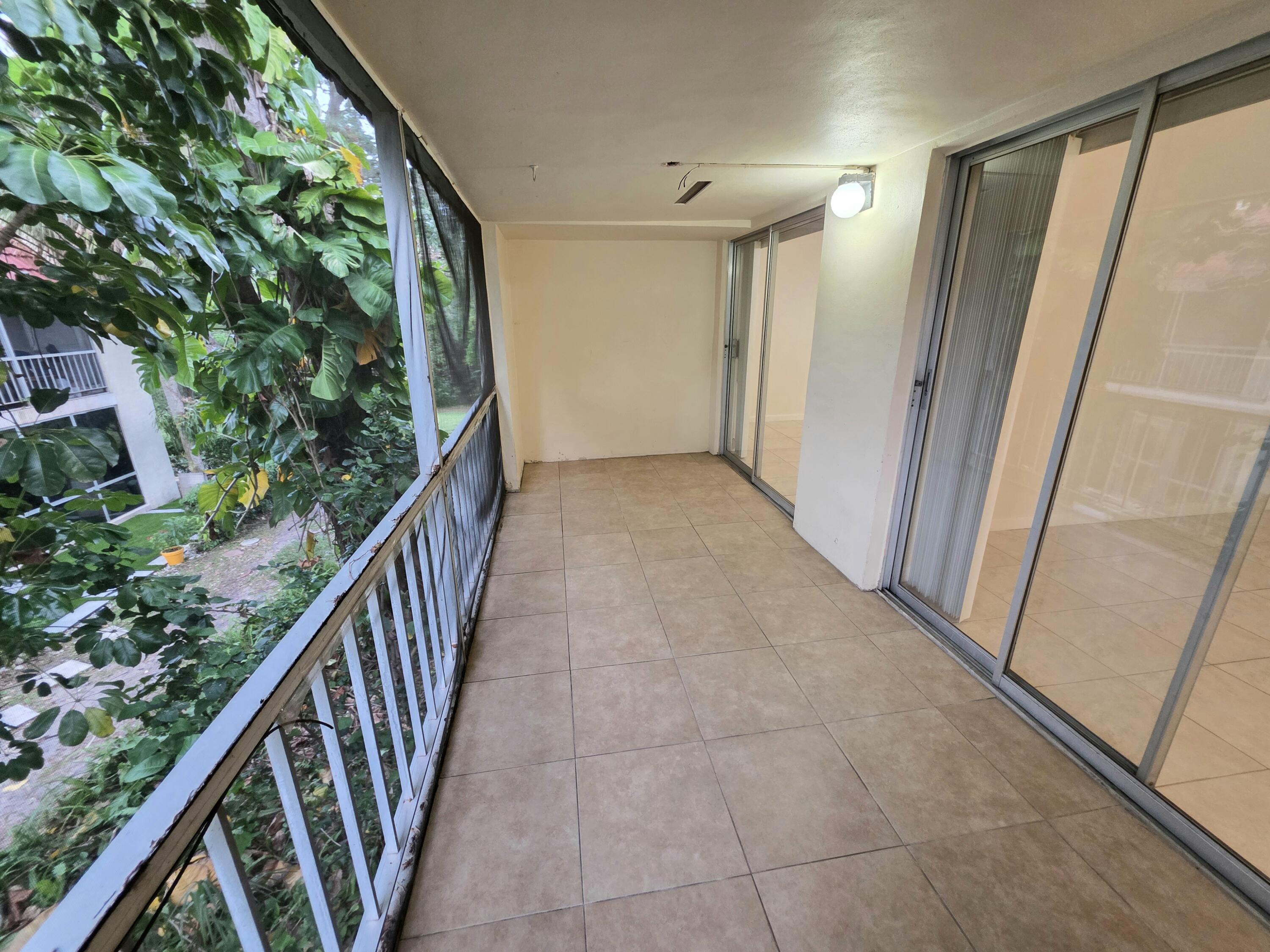 683 Northwest 13th Street, Unit 27 Boca Raton, FL 33486 - Photo 5 of 16 a view of balcony