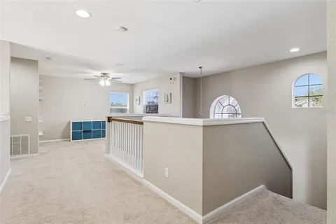 a view of kitchen with cabinets and wooden floor