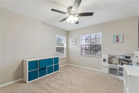 a view of a workspace with furniture