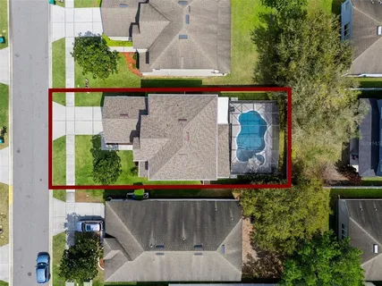 an aerial view of a house with garden