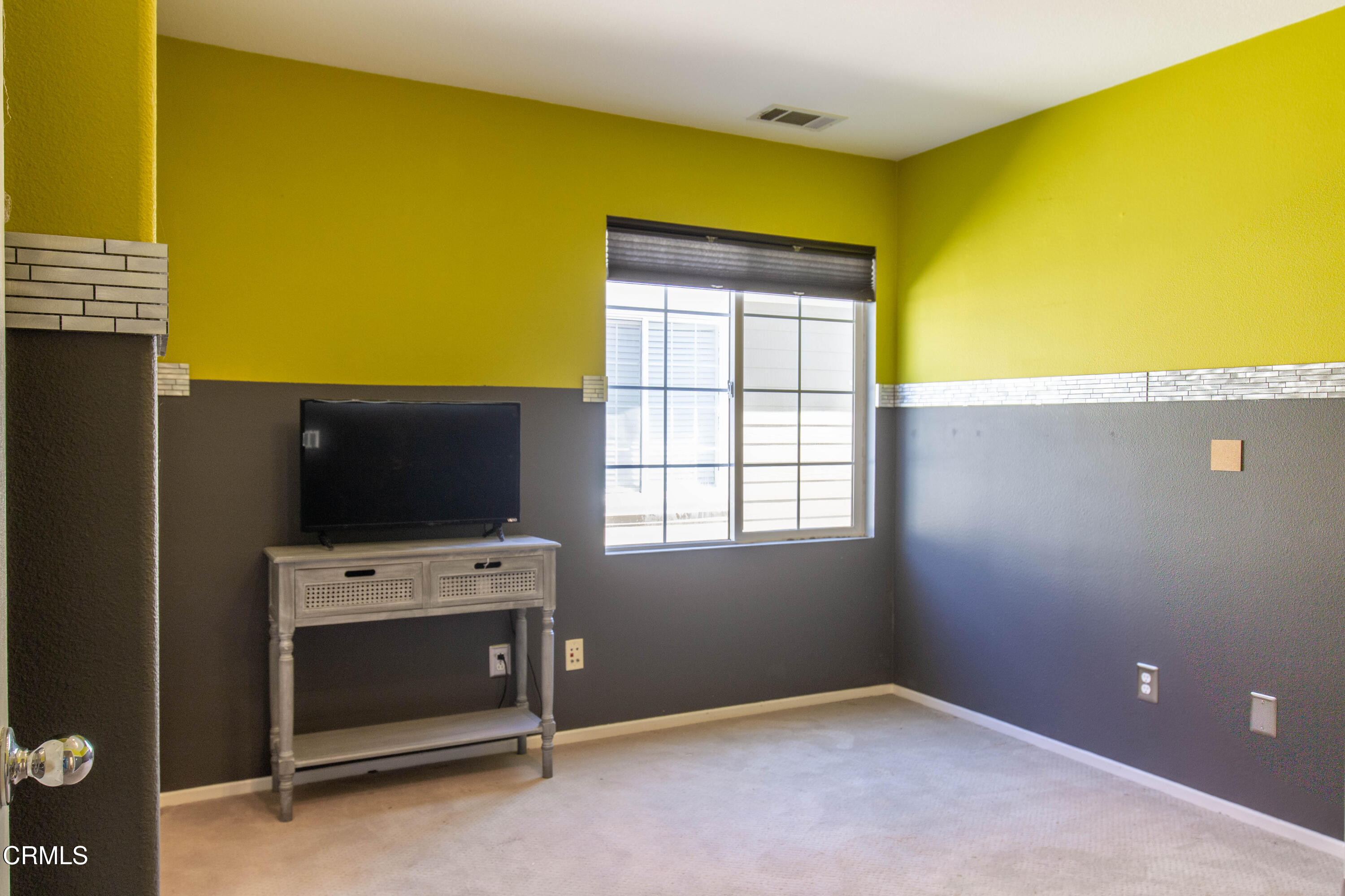 37 St Mays Road Ladera Ranch, CA 92694 - Photo 16 of 27 a view of an empty room with a flat screen tv