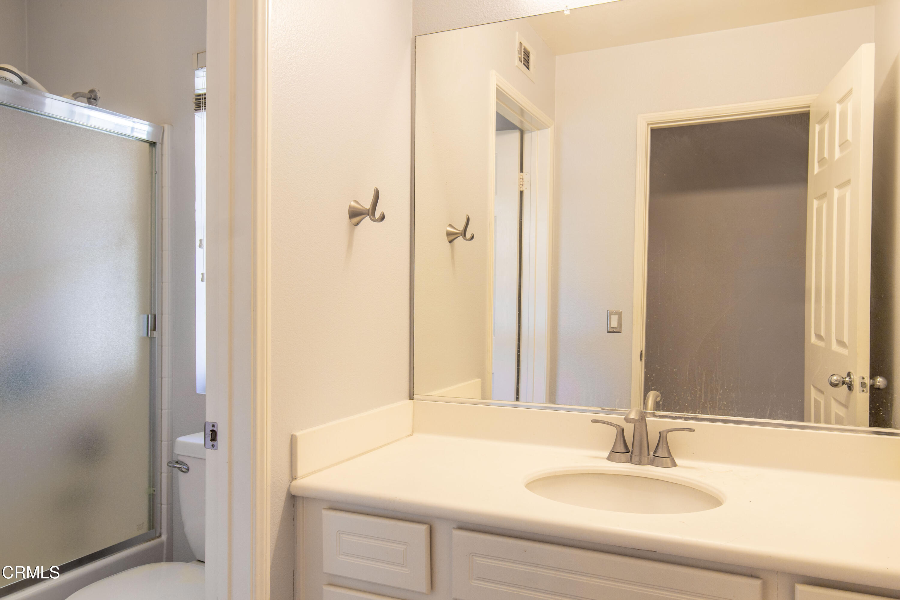 37 St Mays Road Ladera Ranch, CA 92694 - Photo 18 of 27 a bathroom with a sink and a mirror