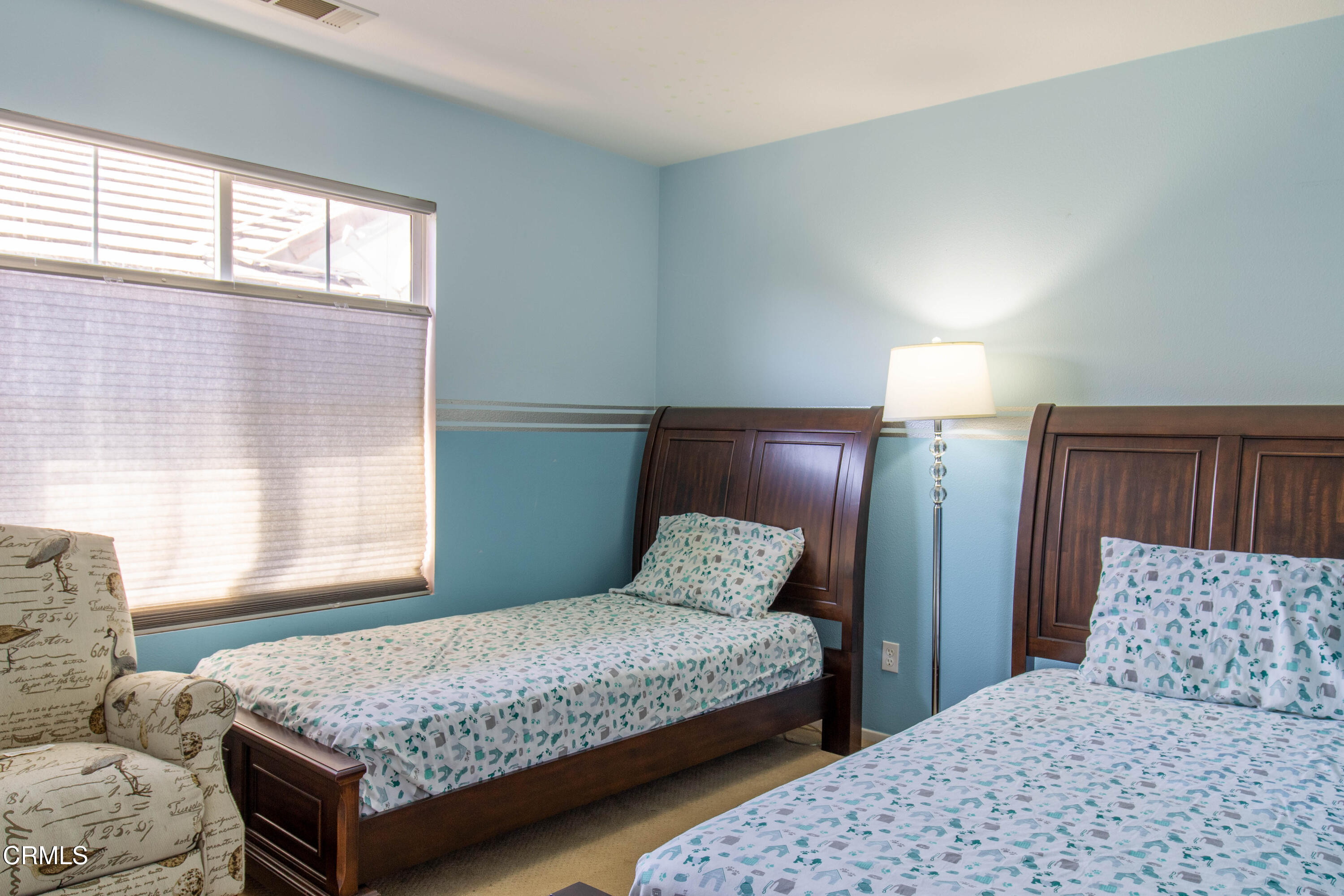 37 St Mays Road Ladera Ranch, CA 92694 - Photo 19 of 27 a bedroom with a large bed and a couch