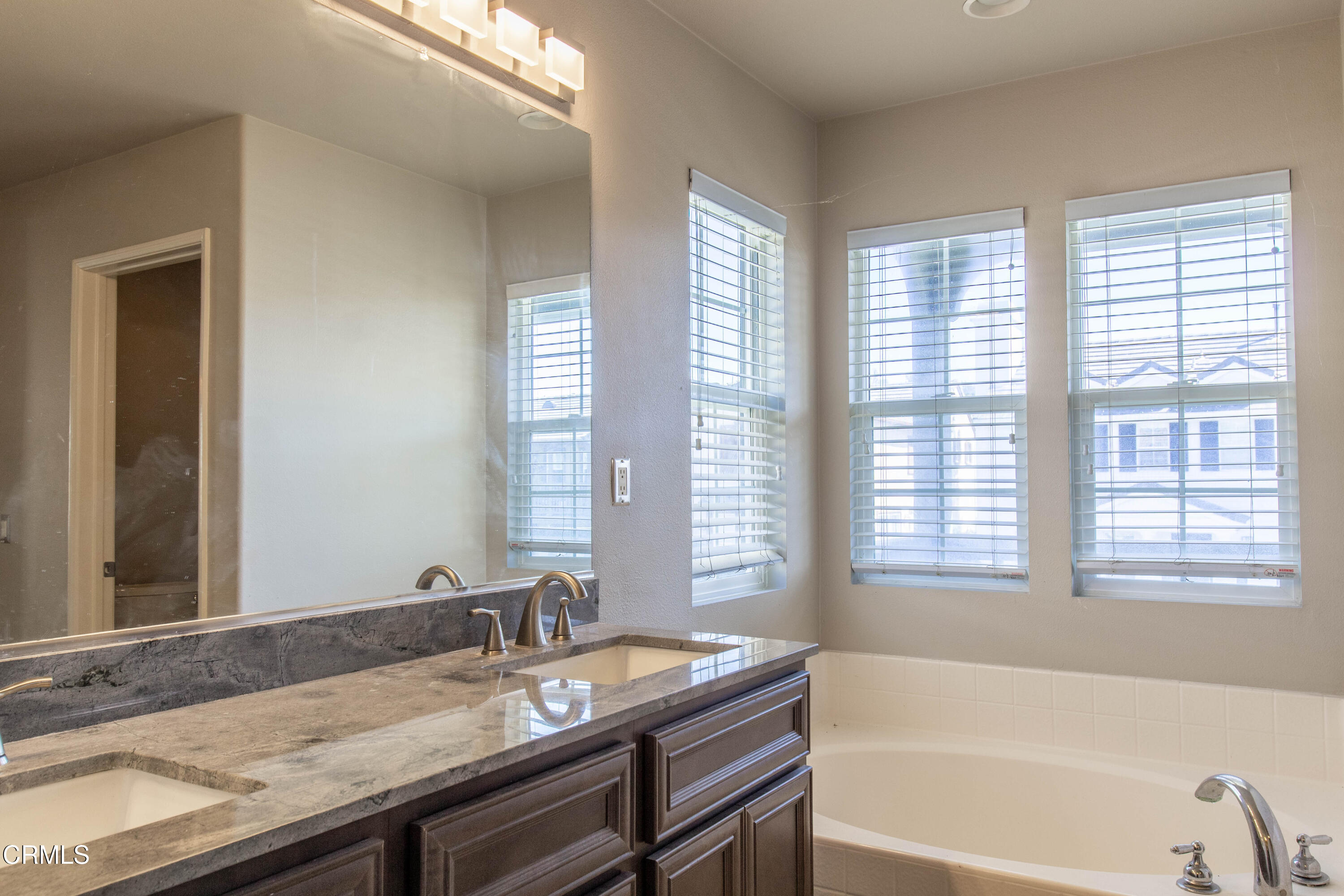 37 St Mays Road Ladera Ranch, CA 92694 - Photo 24 of 27 a bath tub sitting next to a window