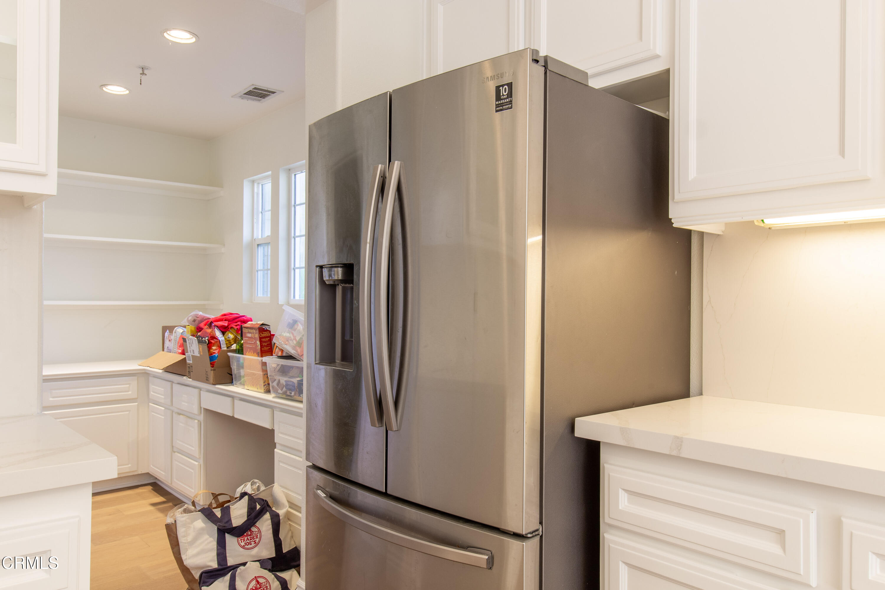 37 St Mays Road Ladera Ranch, CA 92694 - Photo 9 of 27 a kitchen with stainless steel appliances a refrigerator and a sink