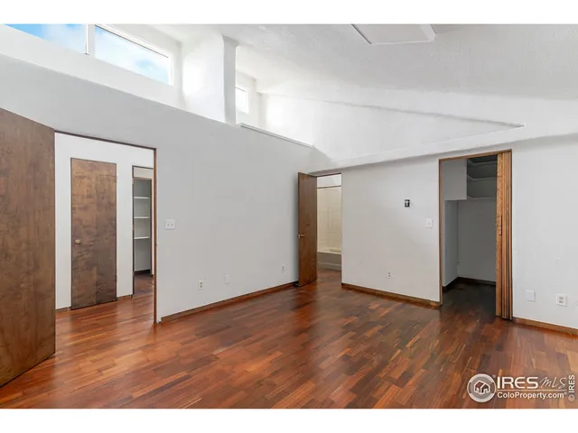 a bathroom with a sink a mirror and shower