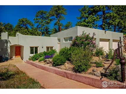 a view of balcony with lounge chair and lake view
