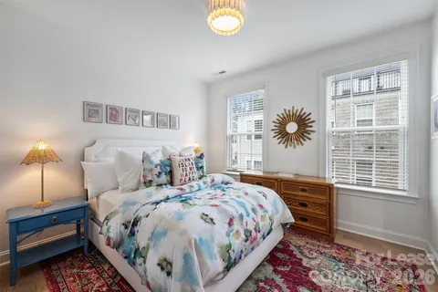 a bathroom with a sink a mirror and a shower