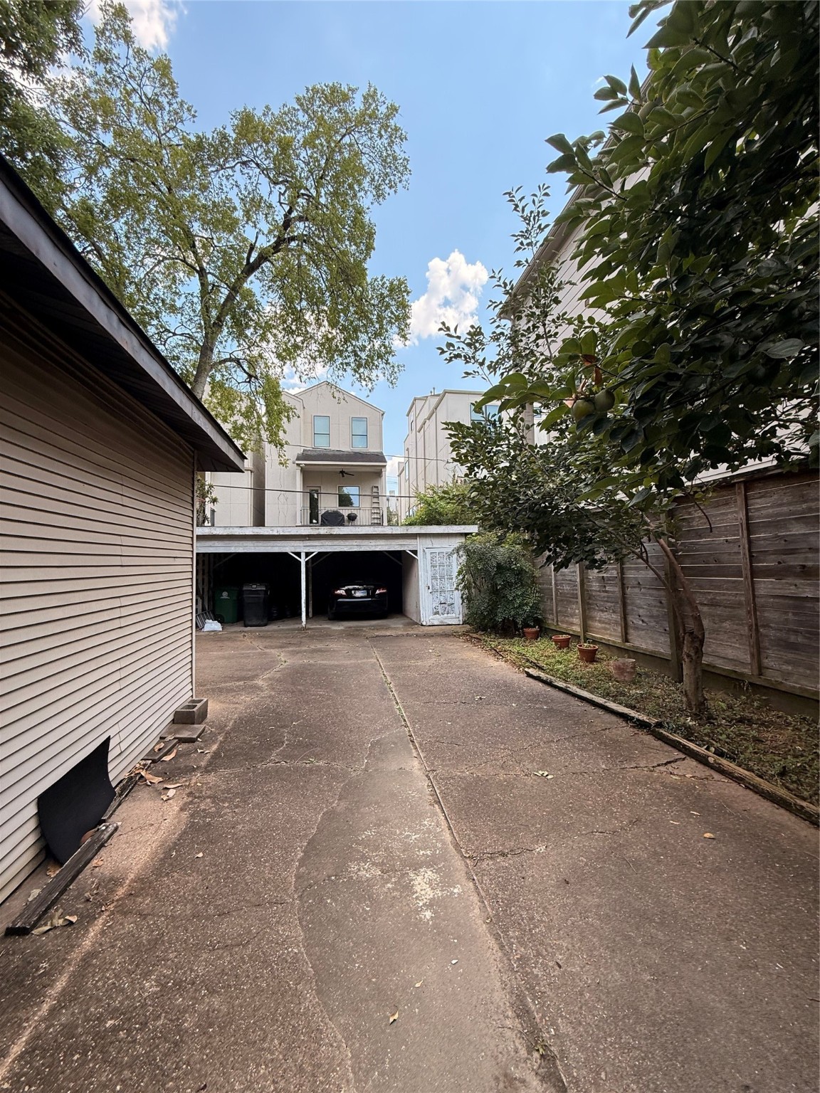 1523 Nevada Street Houston, TX 77006 - Photo 4 of 8 a view of house with outdoor space and trees