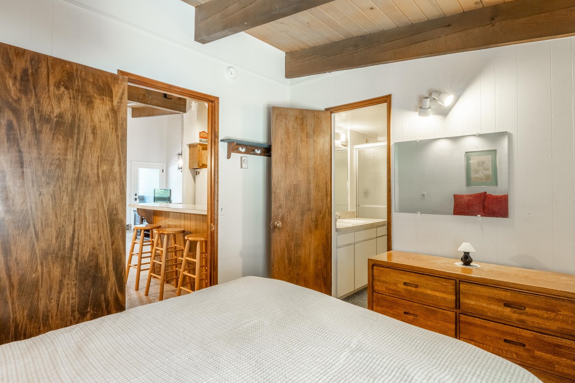 50 Hidden Valley Road, Unit 17 Mammoth Lakes, CA 93546 - Photo 18 of 40 Vaulted wood-paneled ceiling with exposed beams
