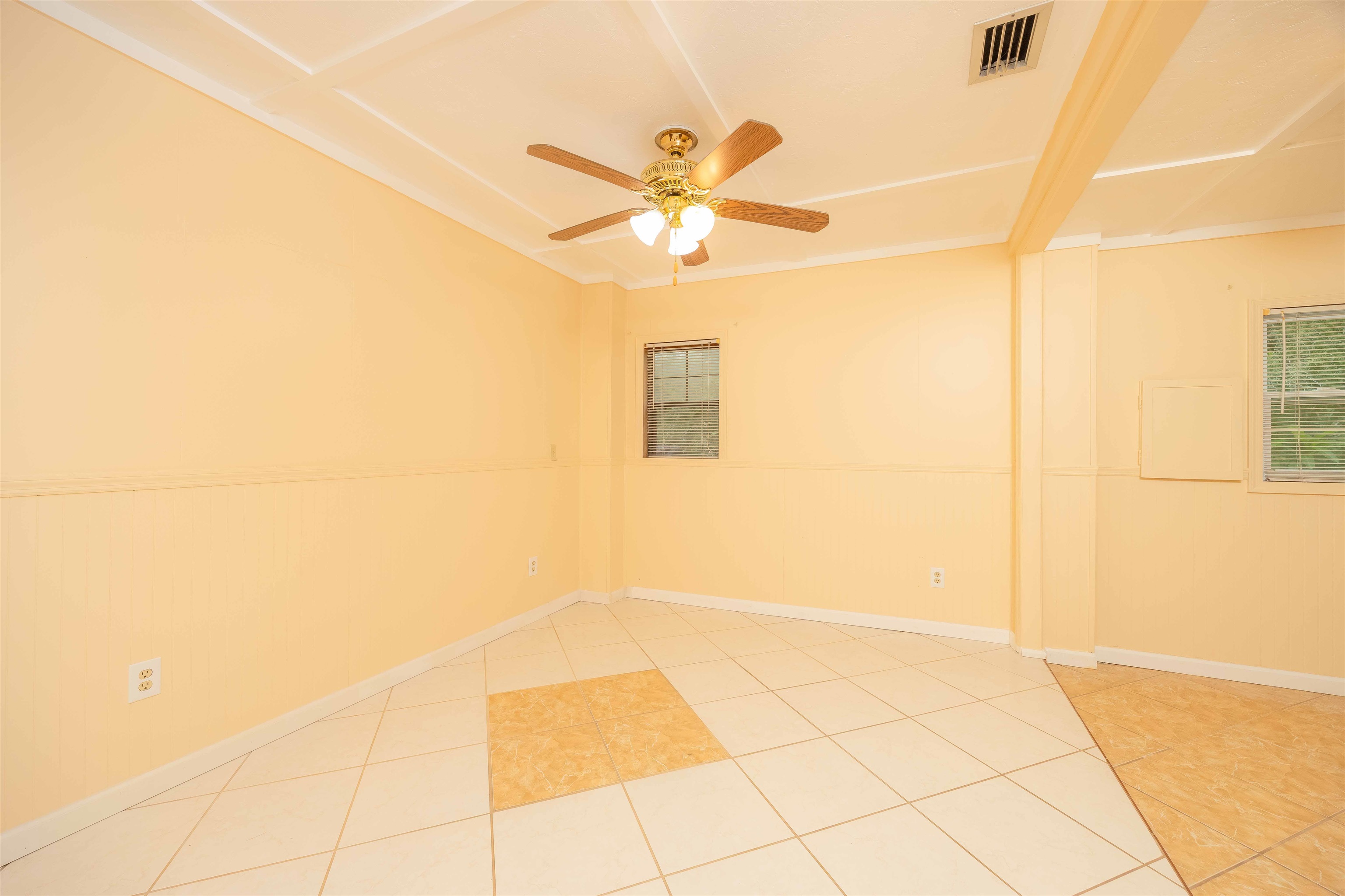 7557 Highway 1 St. Augustine, FL 32086 - Photo 12 of 60 a view of a hallway with a chandelier fan