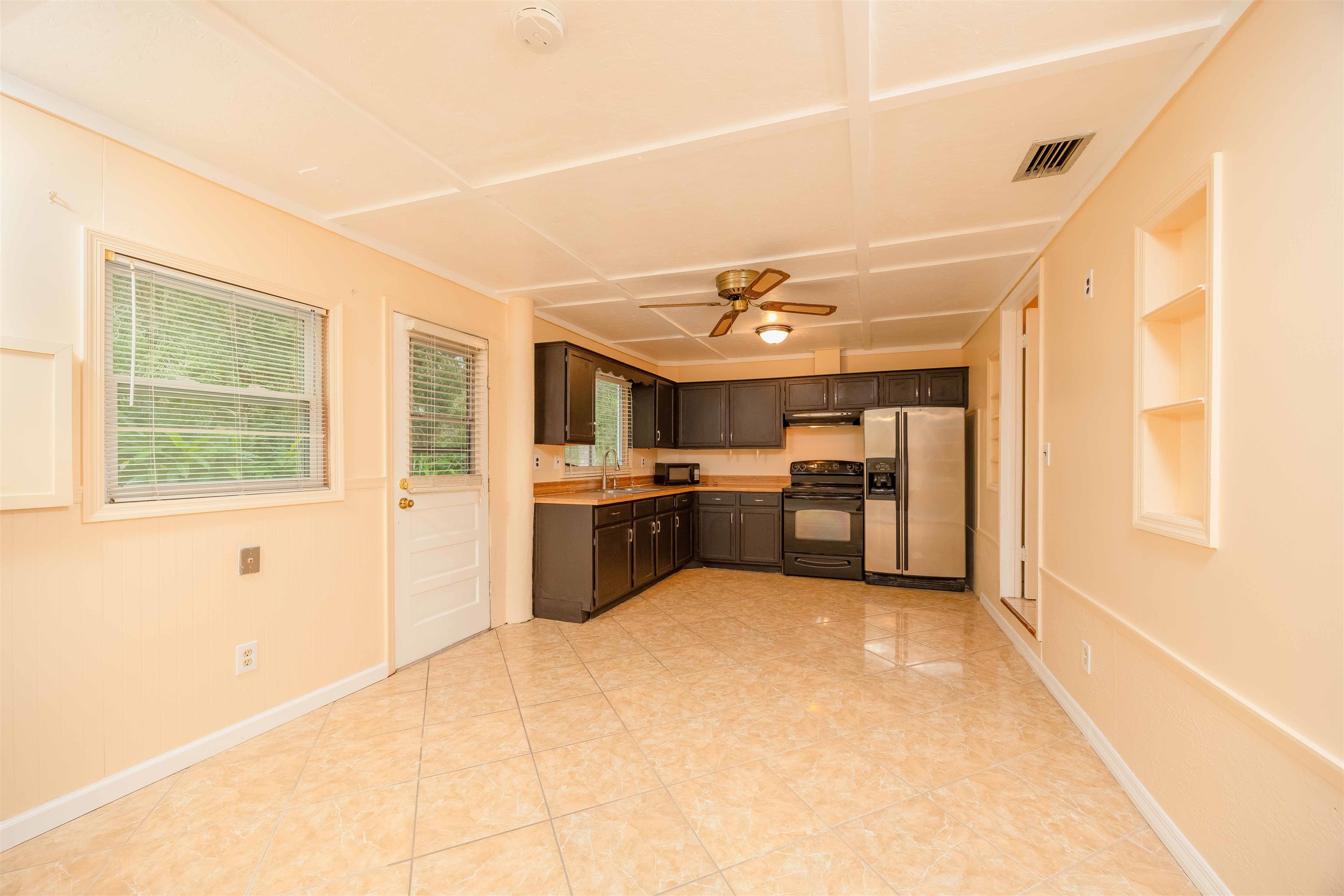 7557 Highway 1 St. Augustine, FL 32086 - Photo 14 of 60 a view of a kitchen with a sink and dishwasher kitchen view