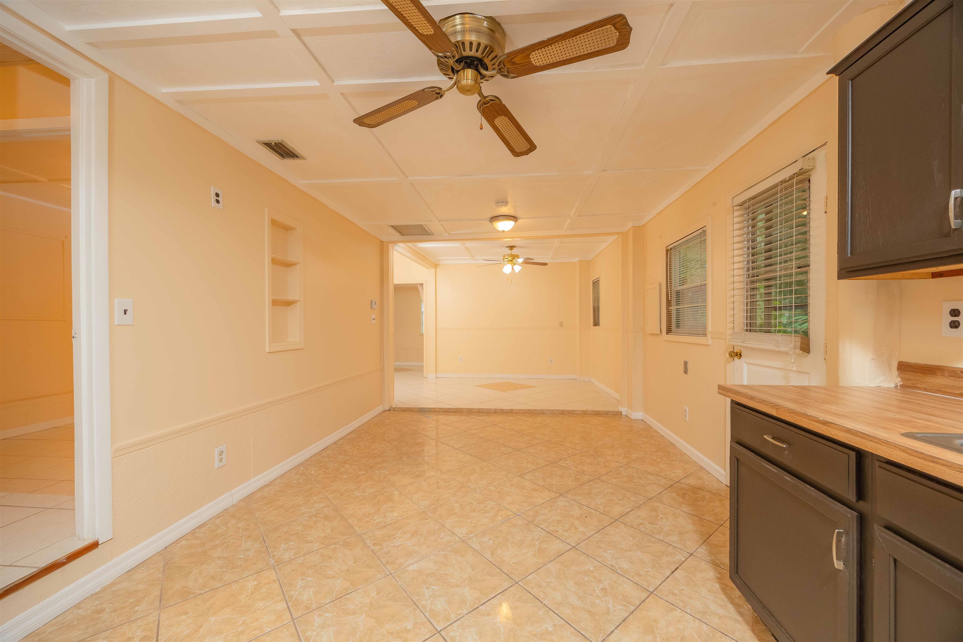 7557 Highway 1 St. Augustine, FL 32086 - Photo 17 of 60 a view of a kitchen with a sink and cabinets