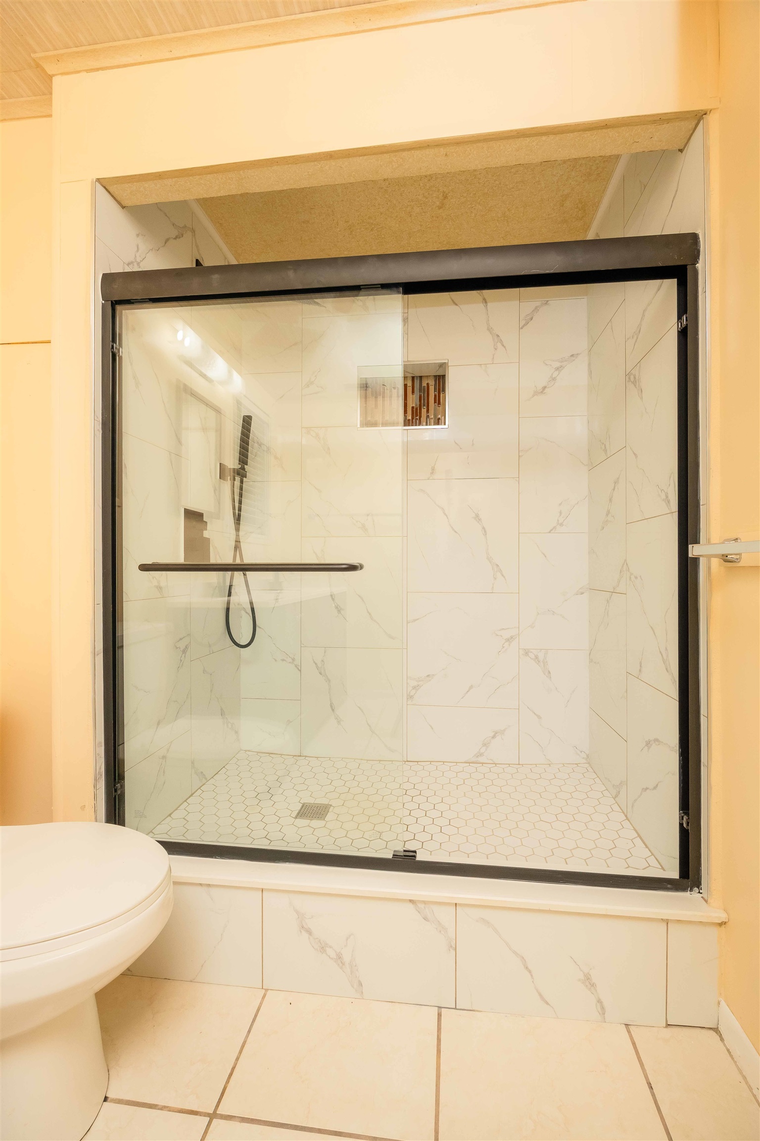 7557 Highway 1 St. Augustine, FL 32086 - Photo 21 of 60 a bathroom with a shower and a toilet