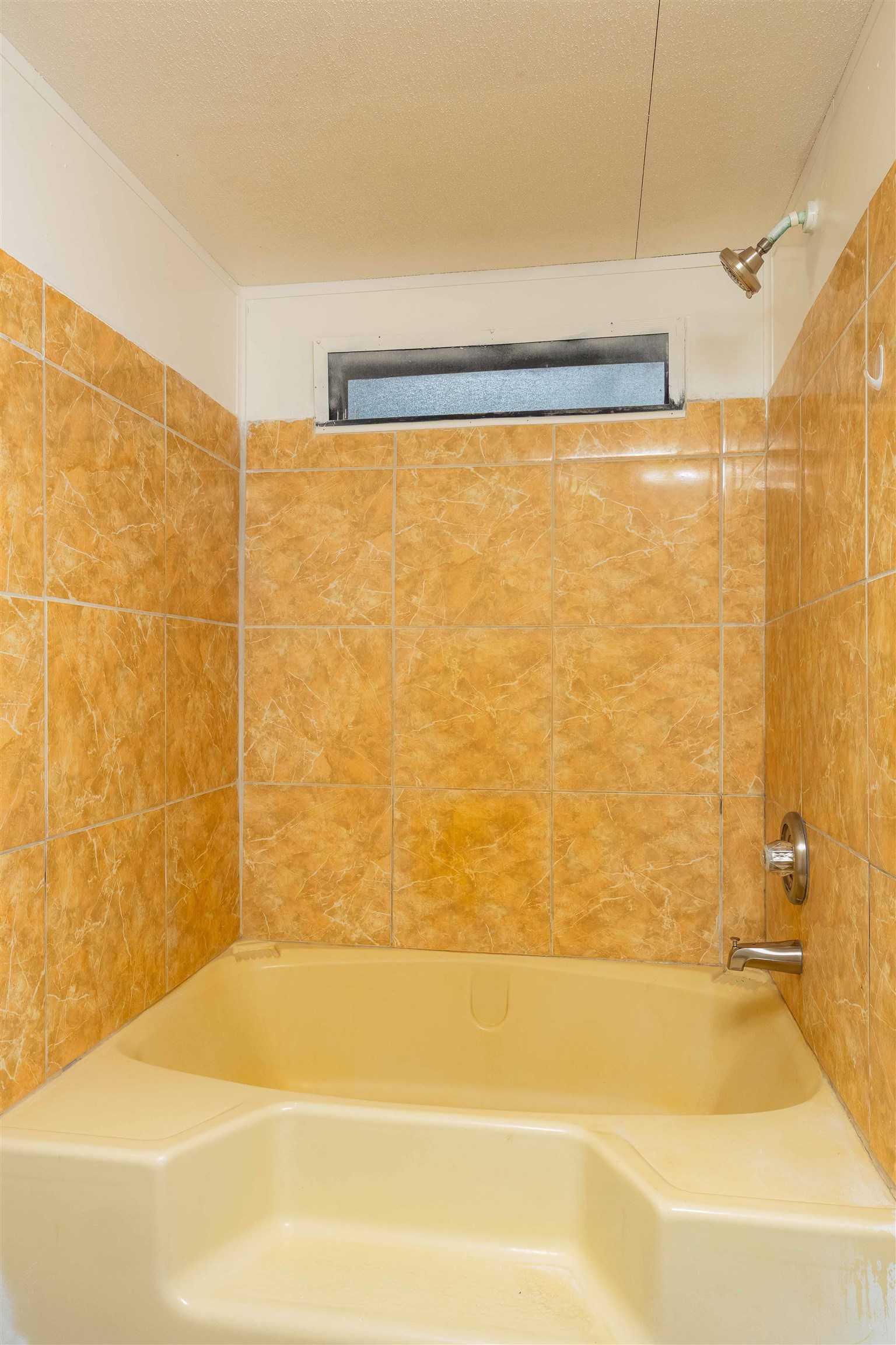 7557 Highway 1 St. Augustine, FL 32086 - Photo 48 of 60 a bathroom with a bathtub and shower