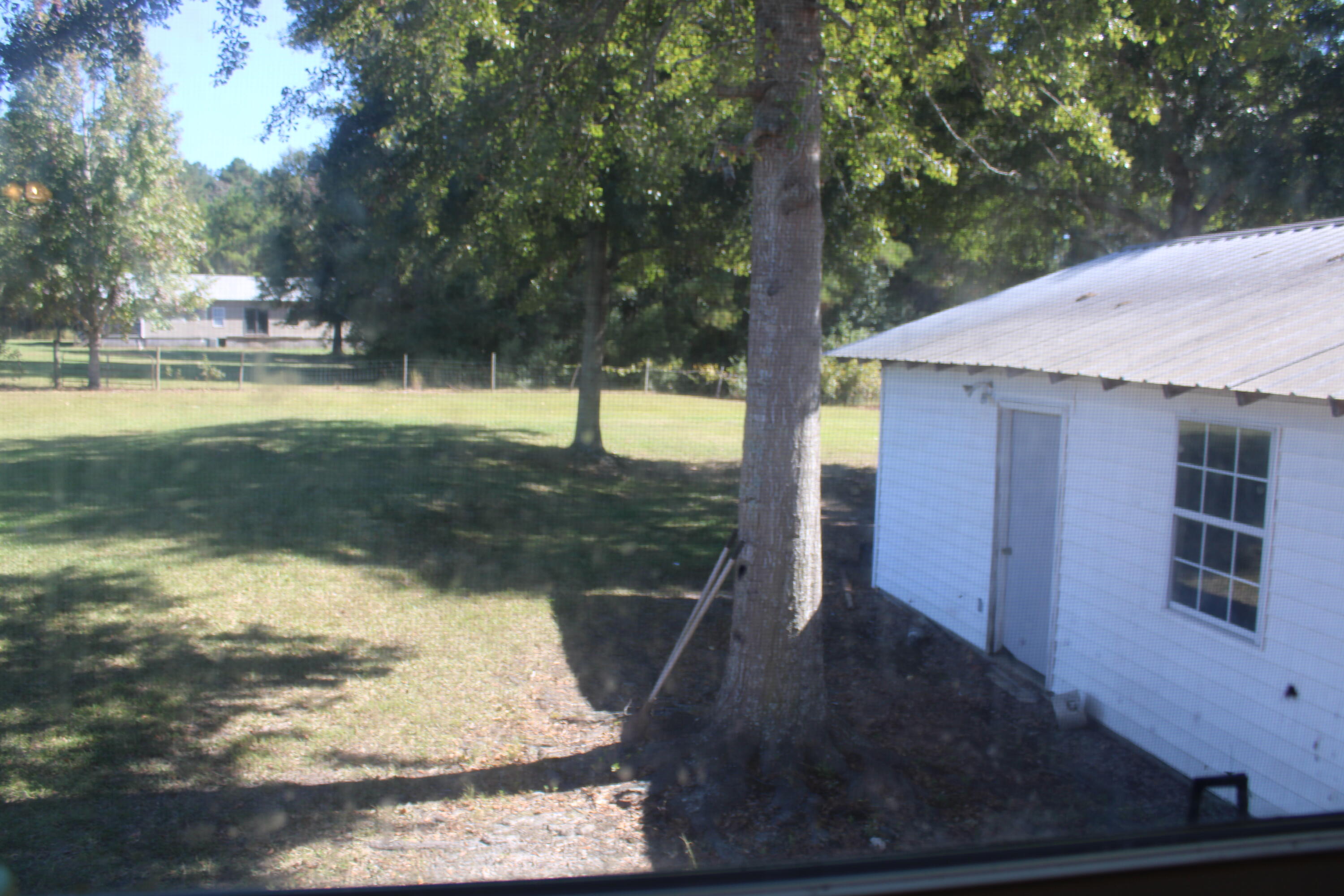 3260 Highway 55 Florala, AL 36442 - Photo 11 of 21 a view of a house with a yard