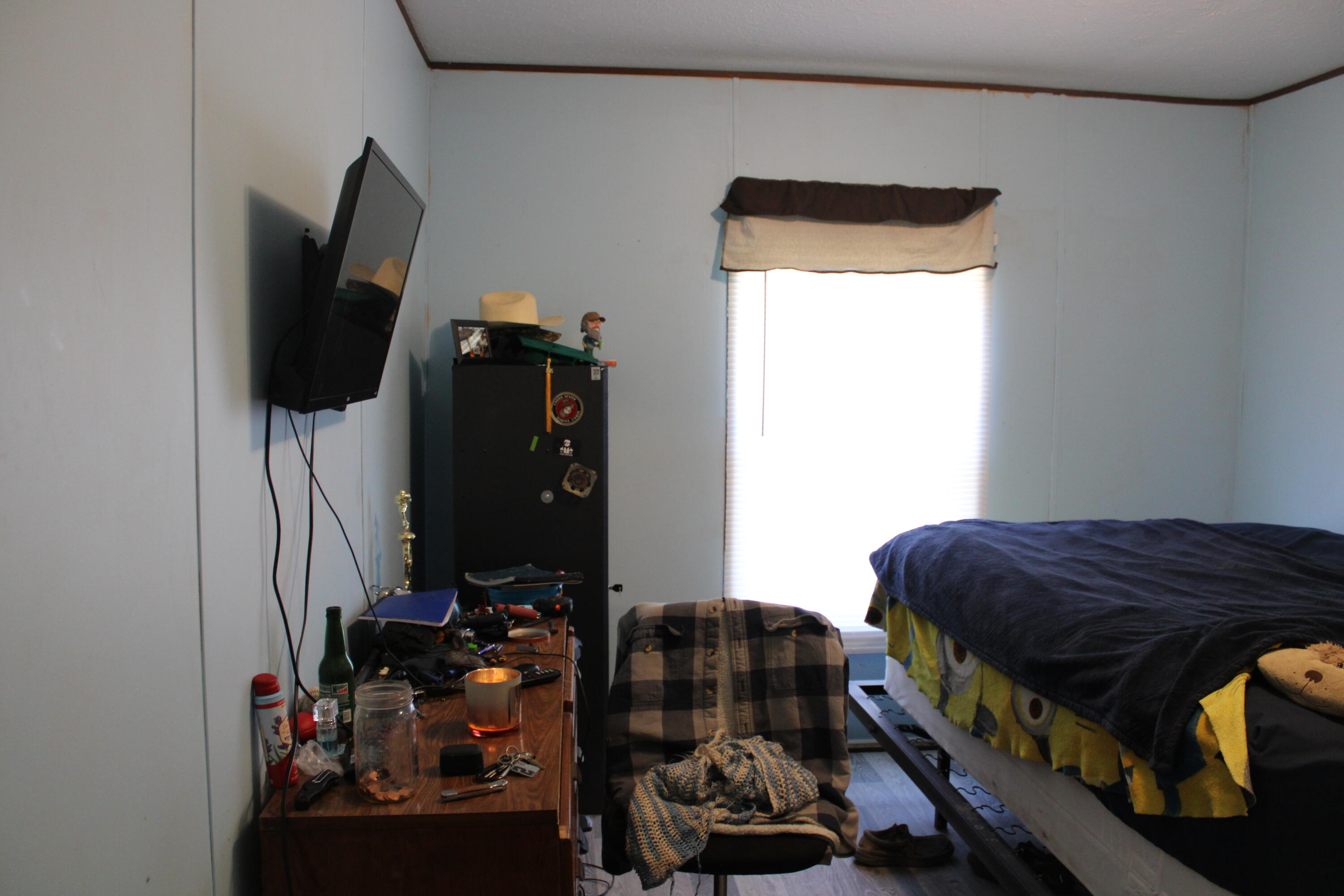 3260 Highway 55 Florala, AL 36442 - Photo 14 of 21 a bedroom with a bed and a flat tv screen