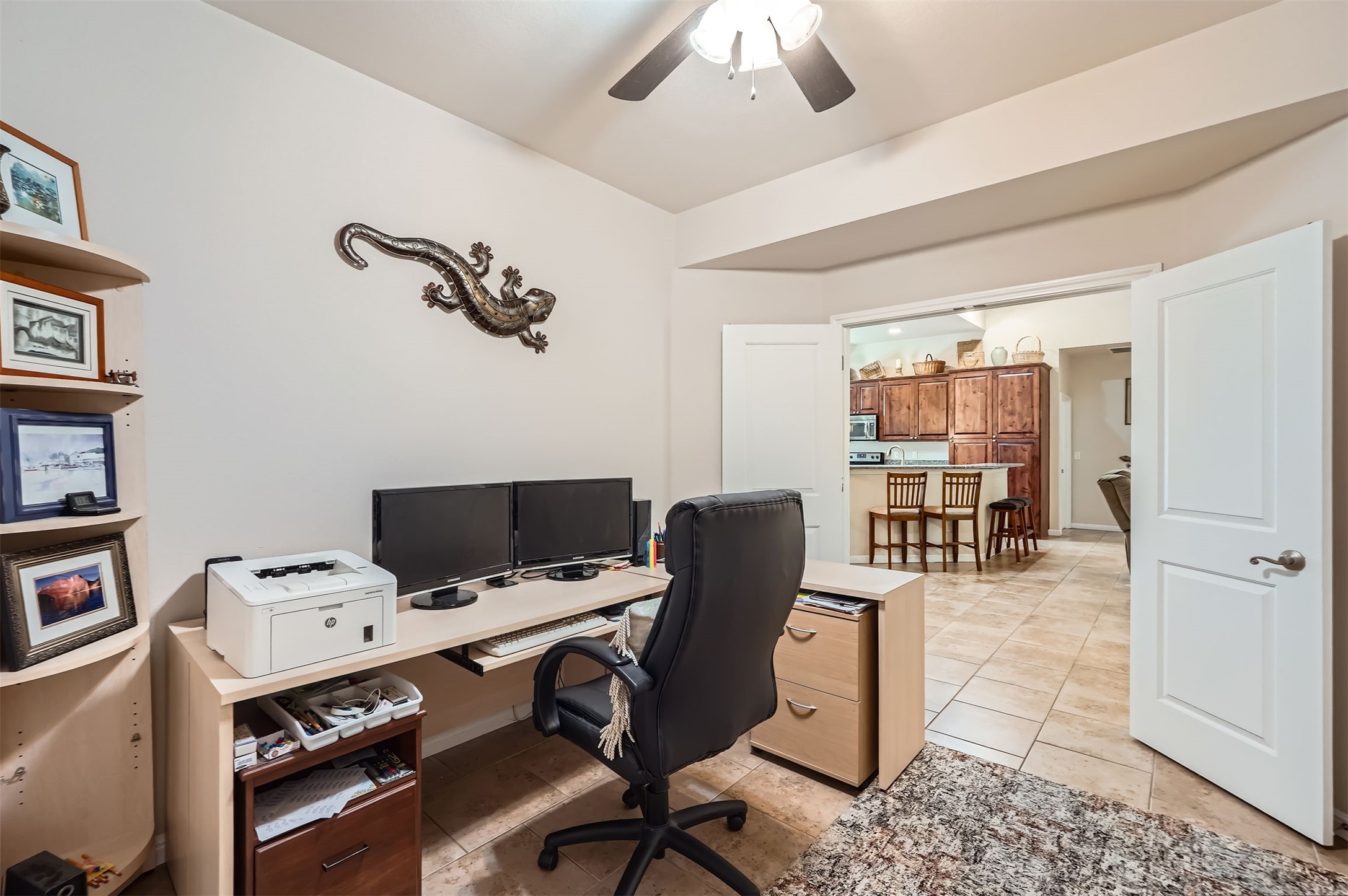 5501 Hitching Post Lago Vista, TX 78645 - Photo 13 of 26 a view of a workspace with furniture and a window