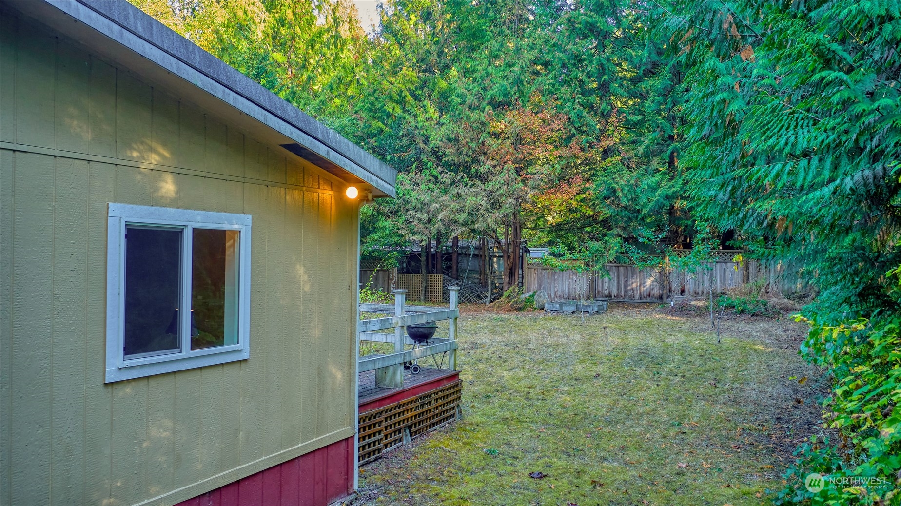 156 Mill Road Point Roberts, WA 98281 - Photo 23 of 27 a backyard of a house with lots of green space