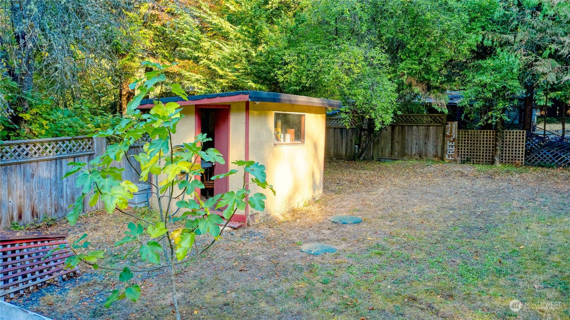 156 Mill Road Point Roberts, WA 98281 - Photo 25 of 27 a front view of a house with a yard