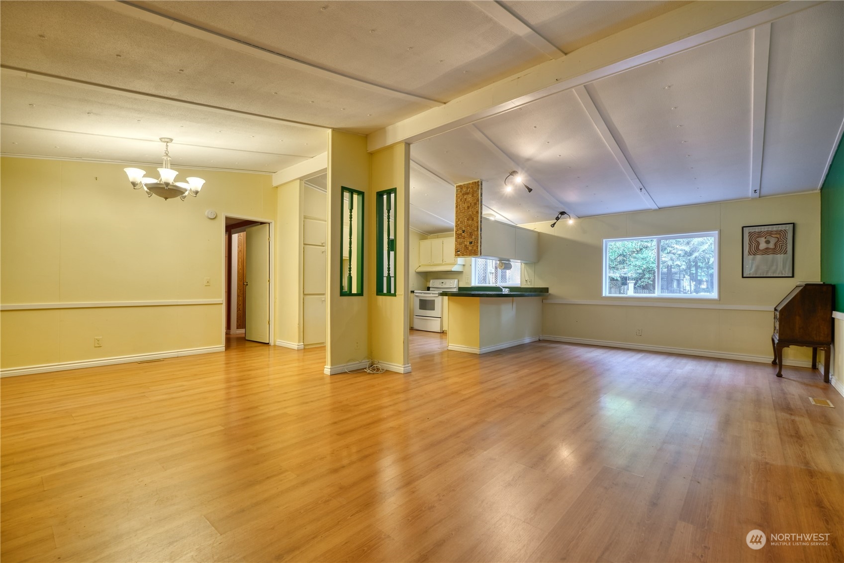 156 Mill Road Point Roberts, WA 98281 - Photo 7 of 27 a view of an empty room with a window