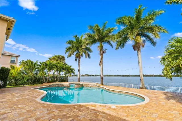 a view of outdoor space with swimming pool