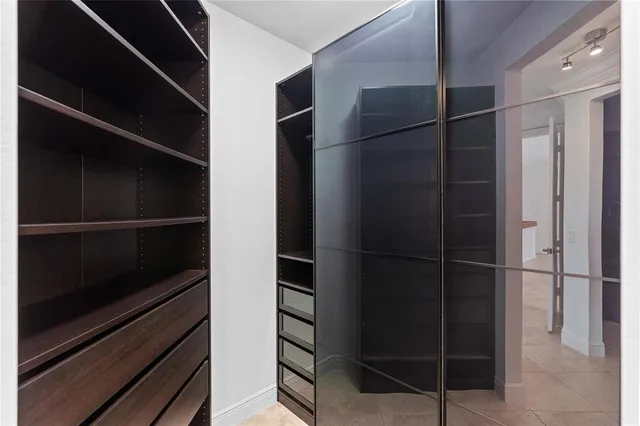 a view of a swimming pool with a yard