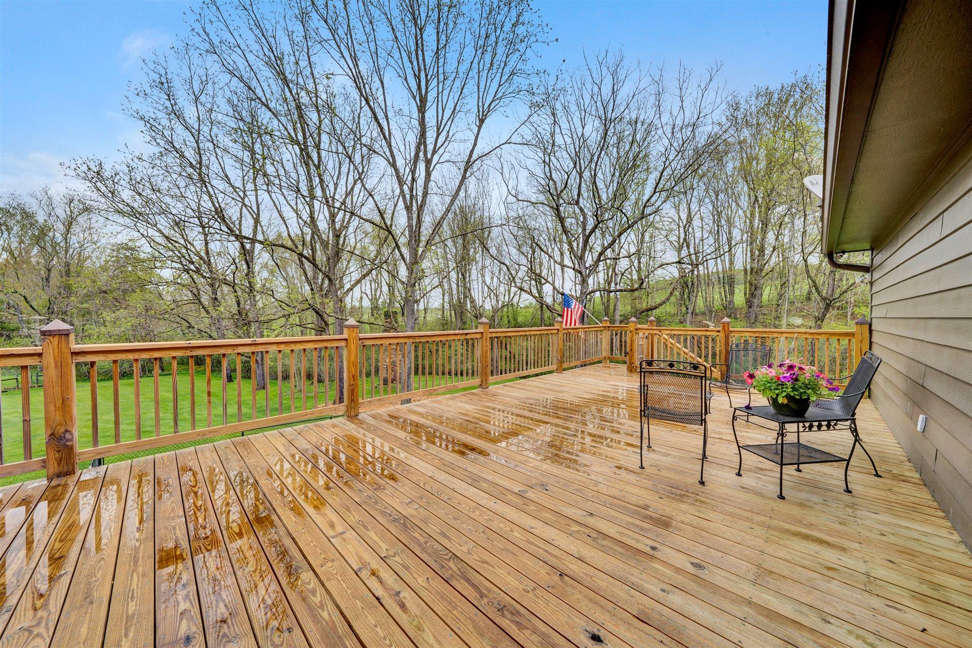 1675 Sandy Flats Road Southeast Floyd, VA 24091 - Photo 40 of 75 a view of deck with wooden floor and outdoor seating