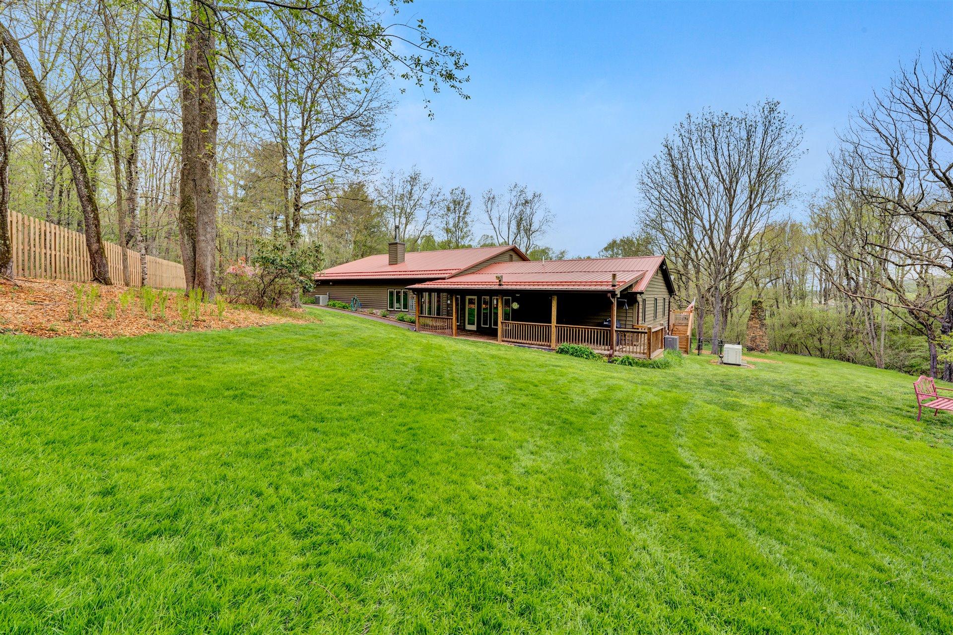 1675 Sandy Flats Road Southeast Floyd, VA 24091 - Photo 50 of 75 a front view of a house with garden