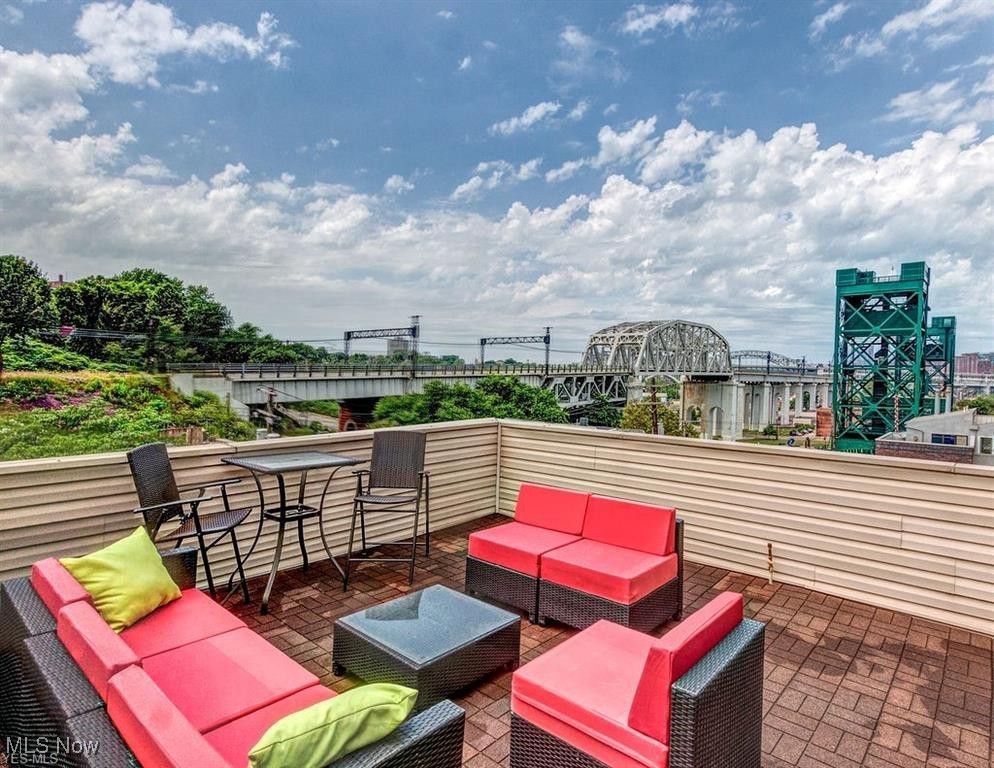 1949 Columbus Road Cleveland, OH 44113 - Photo 2 of 25 Rooftop deck with views of downtown and river