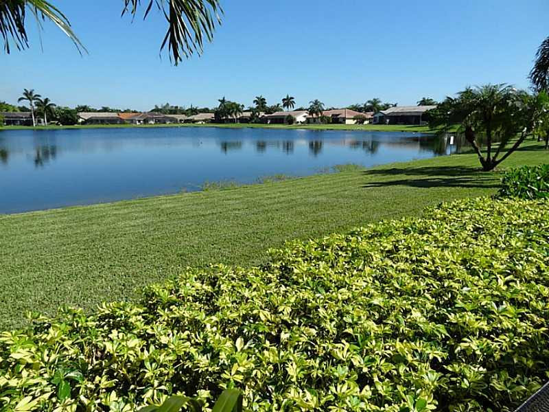 22338 Ensenada Way Boca Raton, FL 33433 - Photo 19 of 20 an aerial view of lake and residential houses with outdoor space