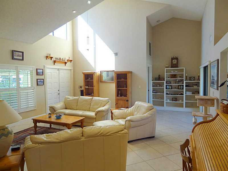22338 Ensenada Way Boca Raton, FL 33433 - Photo 4 of 20 a living room with furniture and a window