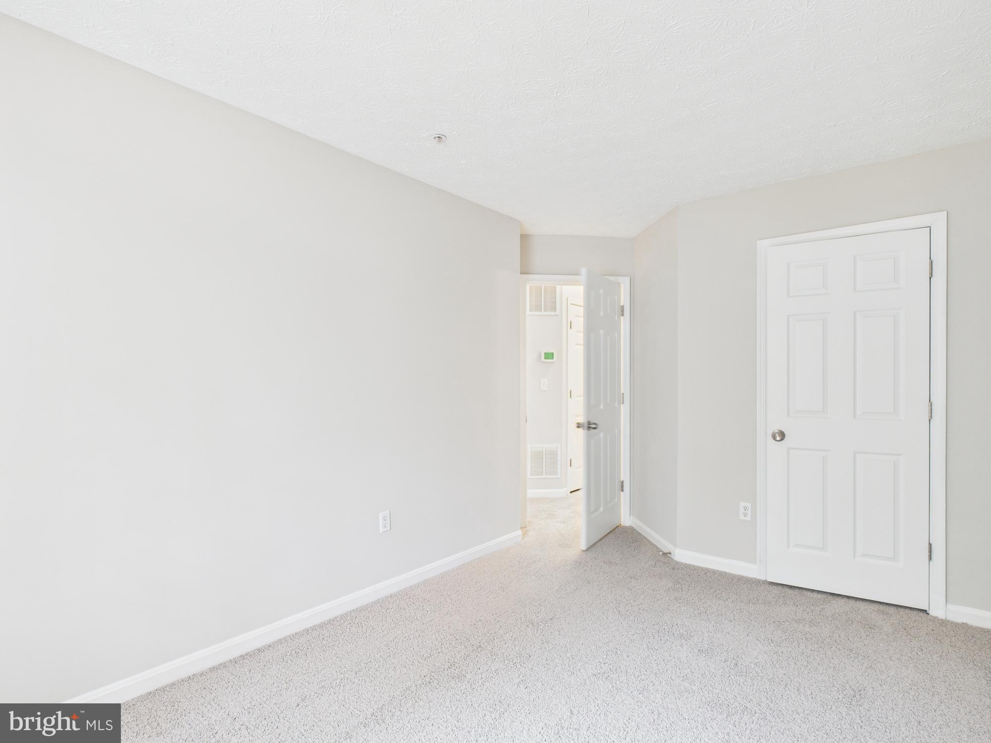 8067 Brookstone Court, Unit 100 Severn, MD 21144 - Photo 18 of 36 a view of an empty room